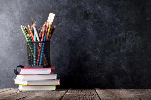 Supplies in front of chalk board