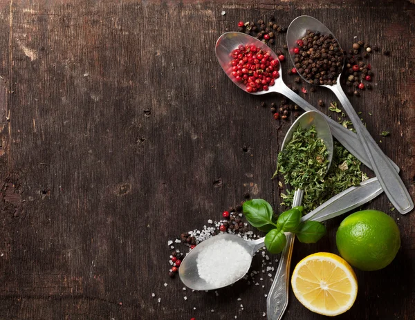 Herbs and spices on table — Stock Photo, Image