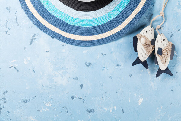 Beach accessories. Hat and fish decor