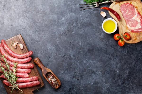 Raw sausages and ingredients — Stock Photo, Image