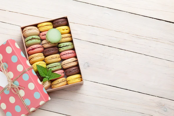 Colorful macaroons in gift box