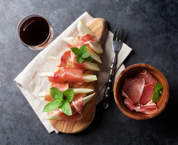 Meloen met prosciutto en wijn — Stockfoto