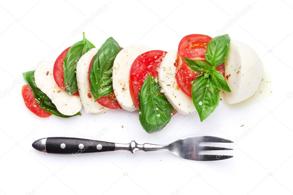 Caprese salad and fork