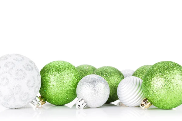 Green and silver christmas baubles — Stock Photo, Image