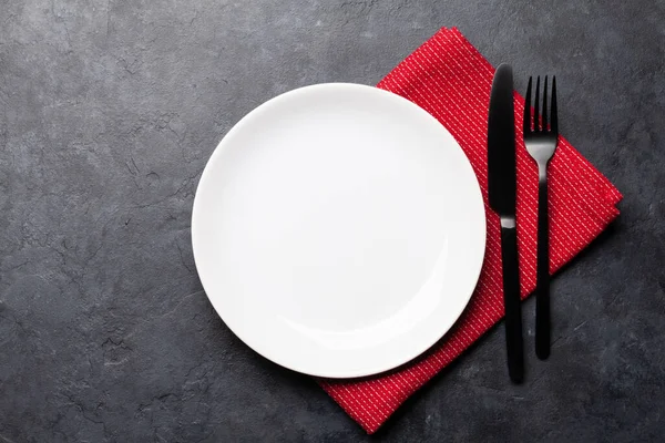 White Empty Plate Fork Knife Napkin Stone Table Top View — Stock Photo, Image