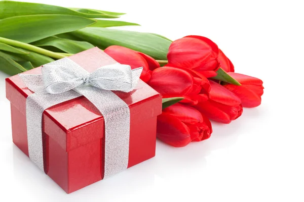 Fresh red tulips with gift box — Stock Photo, Image