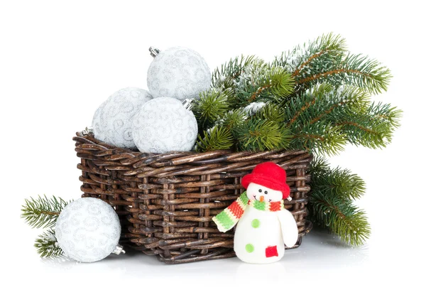 Silver christmas baubles and fir tree — Stock Photo, Image