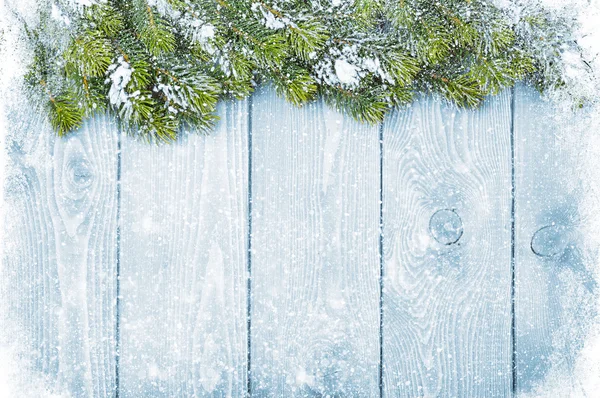 Gamla trä textur med snö och firtree — Stockfoto