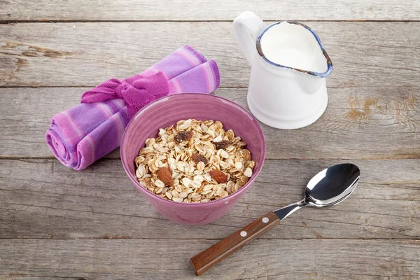 Healthy breakfast with muesli and milk — Stock Photo, Image