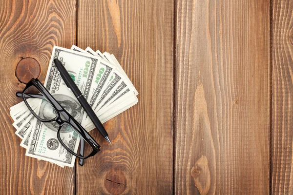 Money cash, glasses and pen — Stock Photo, Image