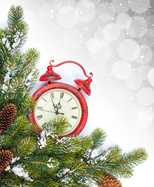 Clock and snow fir tree — Stock Photo, Image