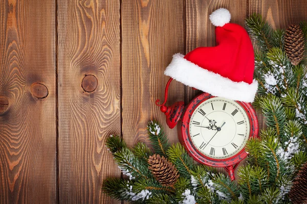 Christmas wooden background with clock — Stock Photo, Image