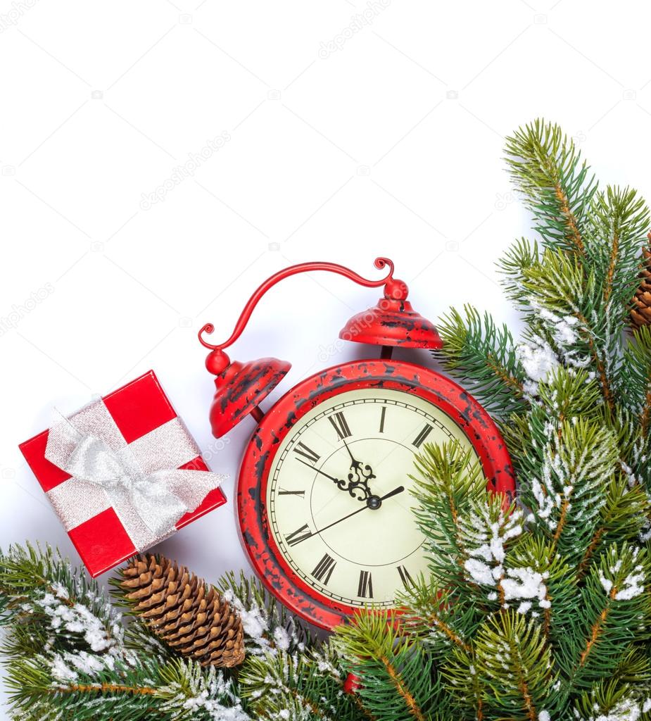 Clock and snow fir tree