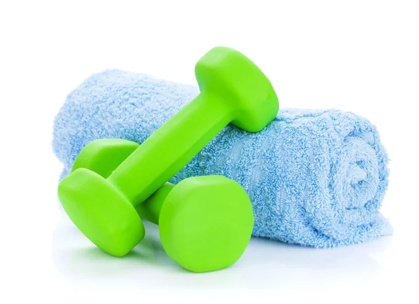 Two green dumbells and towel — Stock Photo, Image