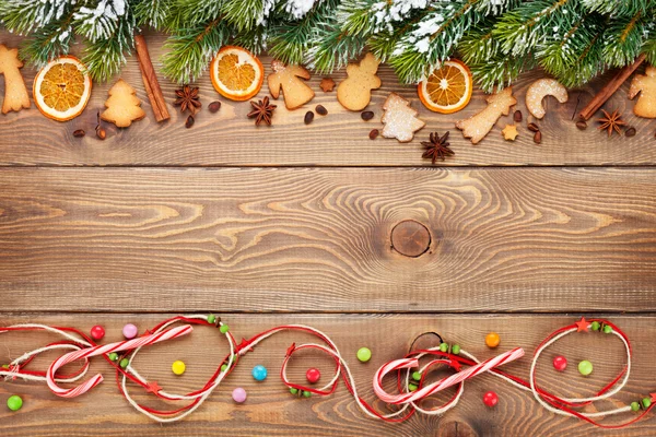 Christmas wooden background with fir tree — Stock Photo, Image