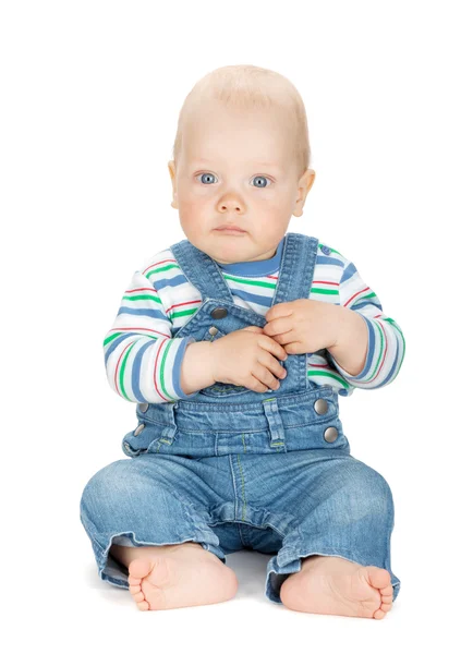 Kleine schattige babyjongen in spijkerbroek — Stockfoto