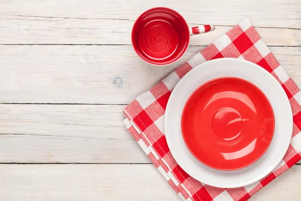 Empty plate, cup and towel — Stock Photo, Image