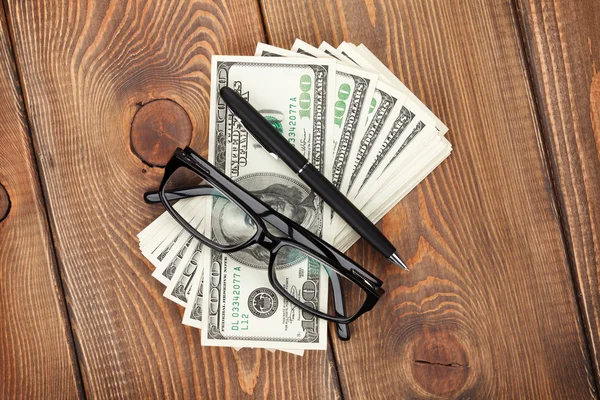 Money cash, glasses and pen — Stock Photo, Image