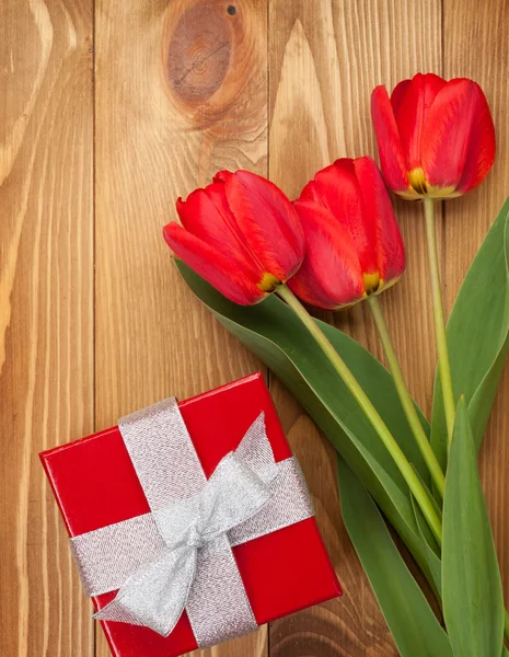 Fresh tulips and gift box — Stock Photo, Image