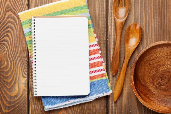 Wood kitchen utensils over wooden table — Stock Photo, Image