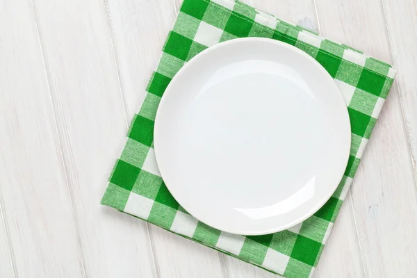 Empty plate and towel — Stock Photo, Image