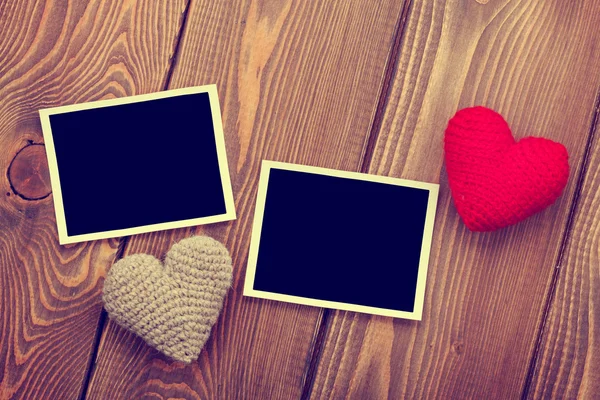 Photo frames and toy hearts — Stock Photo, Image