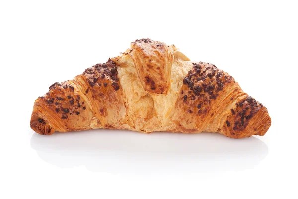 Čerstvý croissant na bílém pozadí — Stock fotografie