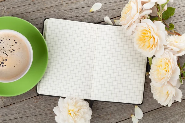 Blank notepad, coffee cup and white rose flowers — Stock Photo, Image
