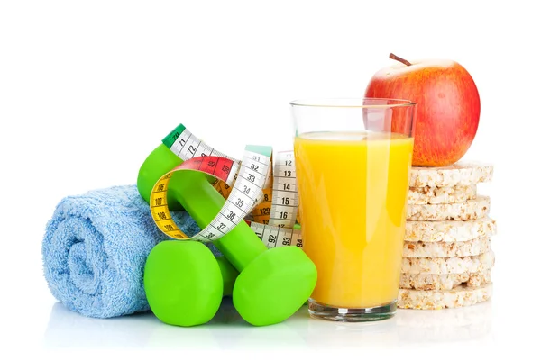 Two green dumbells, tape measure and healthy food — Stock Photo, Image