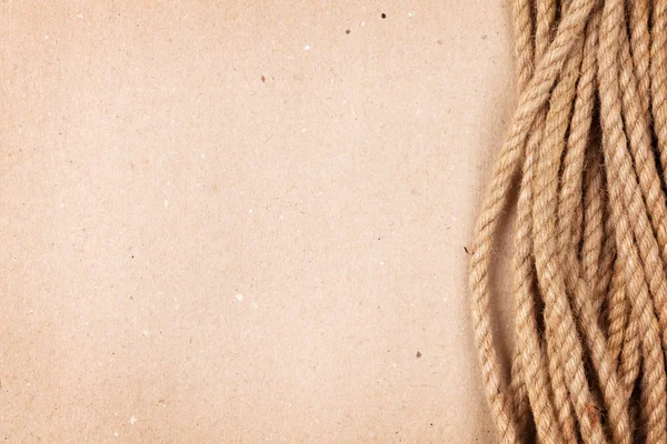 Houten achtergrond met mariene touw — Stockfoto