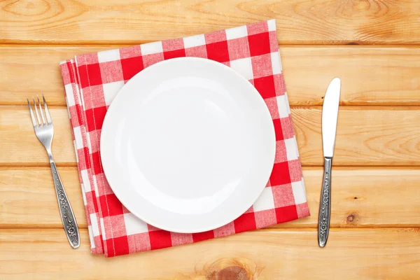 Empty plate, silverware and towel — Stock Photo, Image