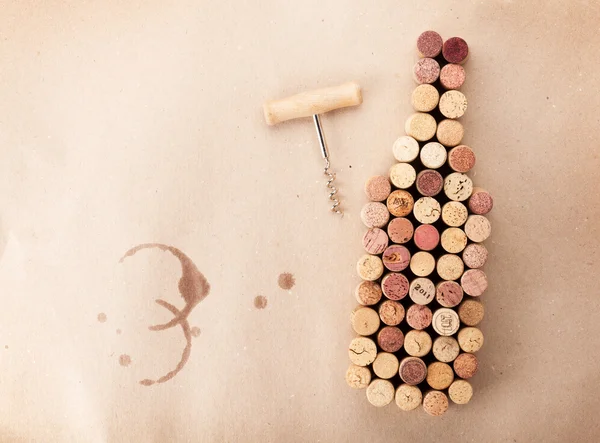 Wine bottle,  corks and corkscrew — Stock Photo, Image