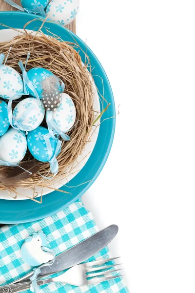 Easter eggs nest on plate — Stock Photo, Image