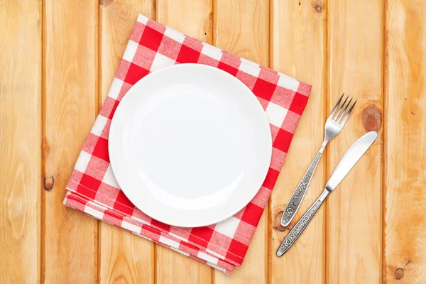 Empty plate, silverware and towel — Stock Photo, Image