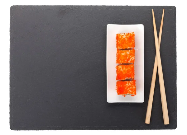 黒い石の上寿司マキ — ストック写真