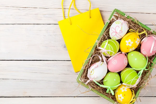 Tło Wielkanoc jaja i prezent — Zdjęcie stockowe