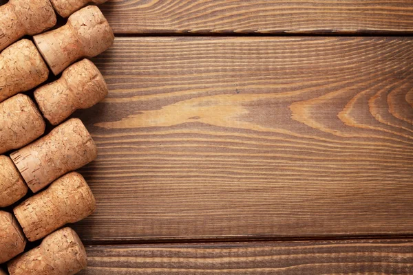 Champagne, wine corks on  table — Stock Photo, Image