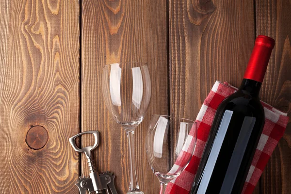 Wine bottle, glasses and corkscrew — Stock Photo, Image