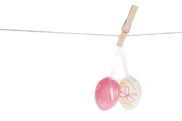 Easter eggs hanging on rope — Stock Photo, Image