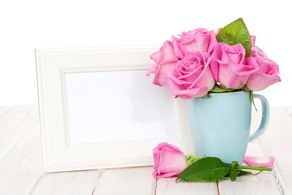 Photo frame and pink roses — Stock Photo, Image