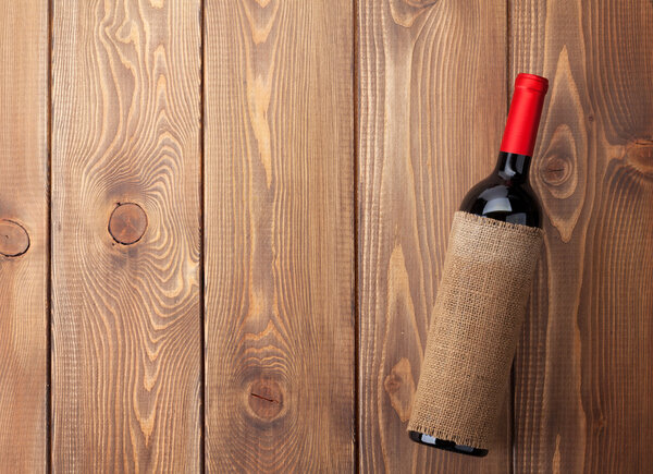 Red wine bottle on  table