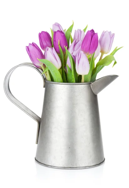 Tulips bouquet in watering can — Stock Photo, Image