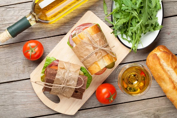 Sandwiches and white wine — Stock Photo, Image