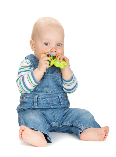 Küçük bebek holding oyuncak — Stok fotoğraf