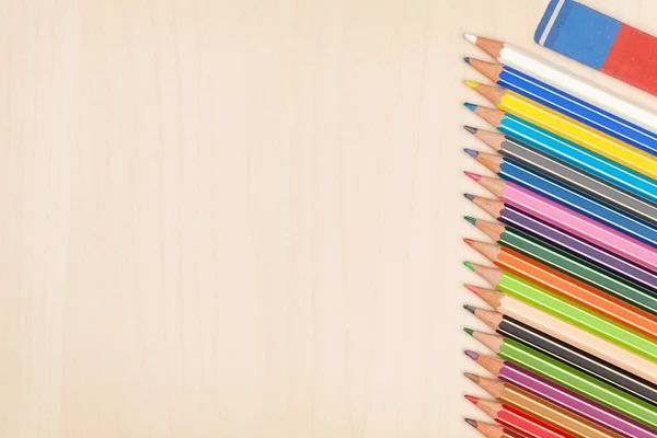 Colorful pencils and eraser — Stock Photo, Image
