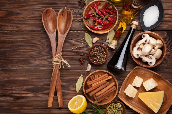 Various spices on wooden background — Stock Photo, Image