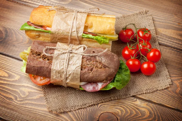 Two sandwiches with salad, ham, cheese — Stock Photo, Image