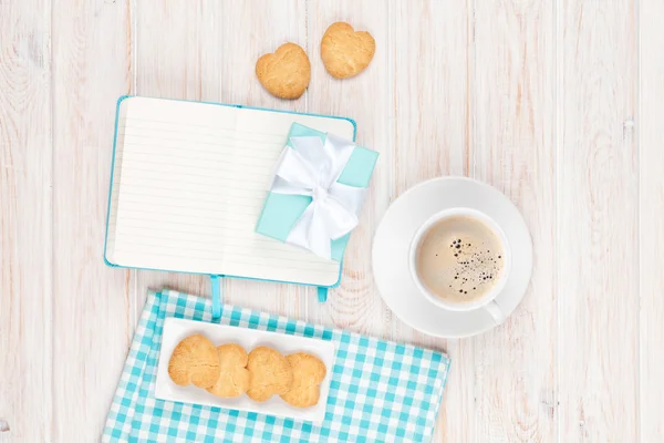 Coffee, heart shaped cookies and notepad — Stock Photo, Image