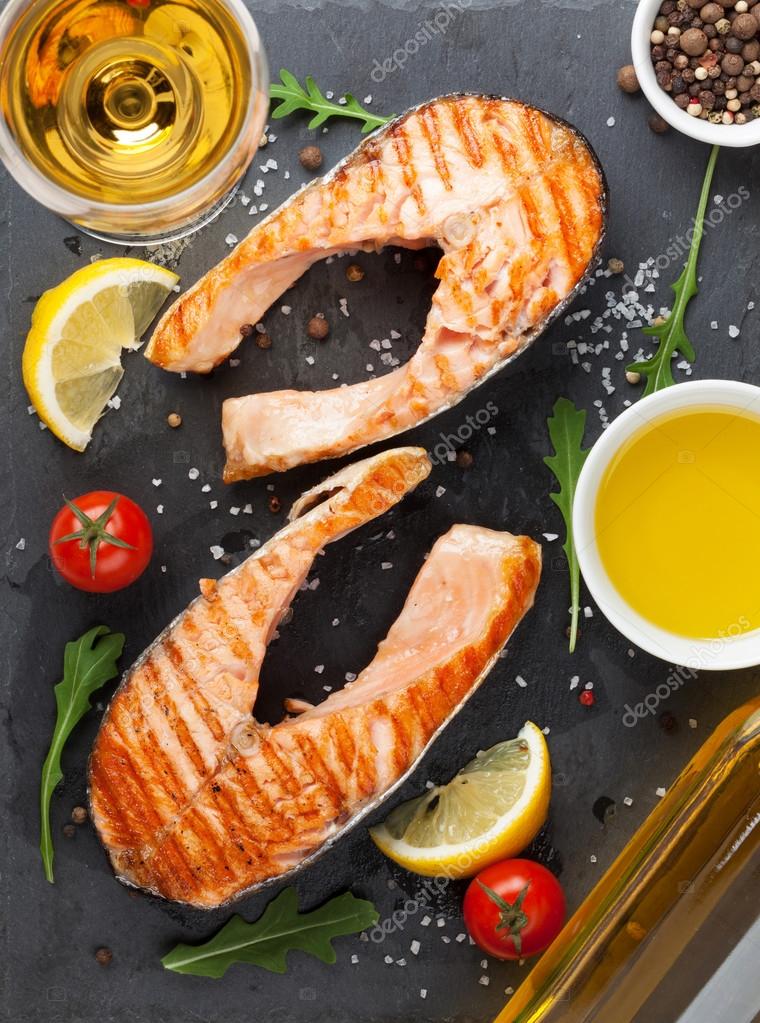 Grilled salmon and white wine — Stock Photo © karandaev #70033505