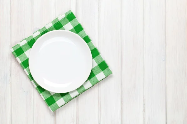 Empty plate and towel — Stock Photo, Image